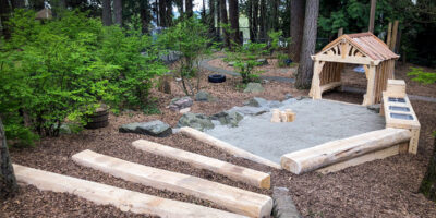 path leading to wooden play hut