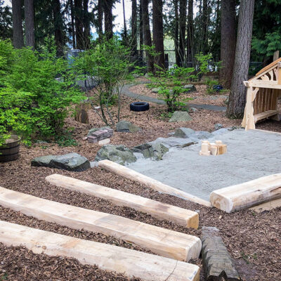 path leading to wooden play hut