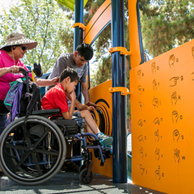 Boy in wheelchair on the playground