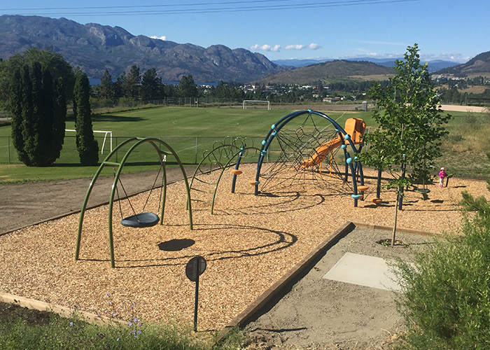 Kinsmen Playground with engineered wood fibre chips
