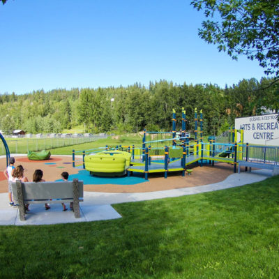 Quesnel Arts & Rec Inclusive Playground with rubber surfacing