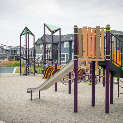 Purple playground with slide and climbing structures