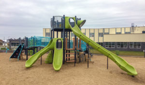 Riverstone Playground with tower structure and slides