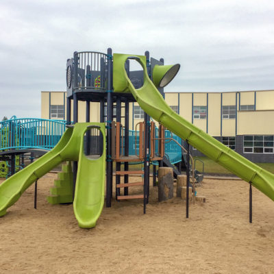 Riverstone Playground with tower structure and slides