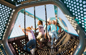 Children inside Hedra playground structure