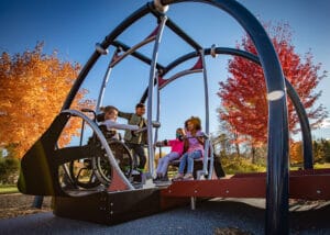 Inclusive Playground Design swing with wheelchair user