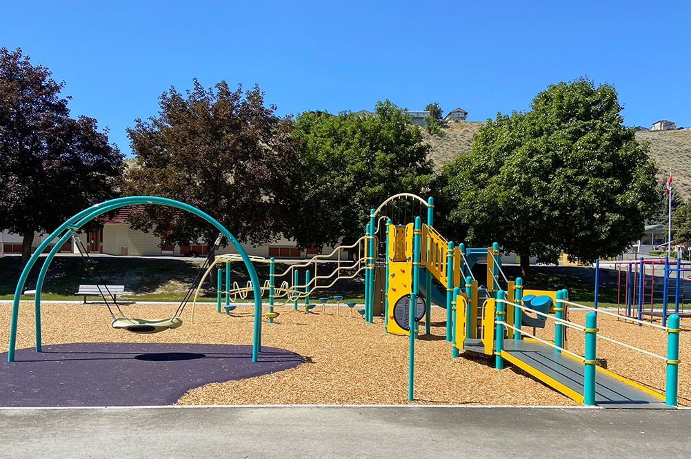 Westmount Elementary's inclusive playground design featuring an accessible swing and ramps