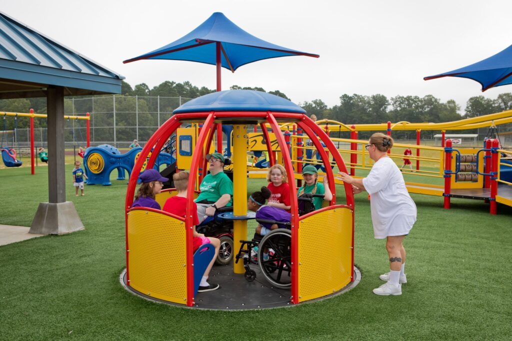 Playground spinner on artificial turf