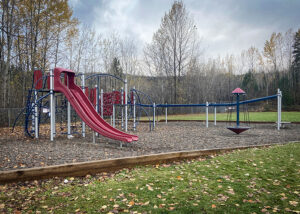 Playground with slide and spinner