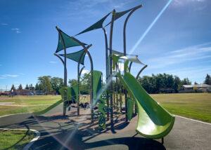 Photo of brown and green playground on PIP rubber surfacing