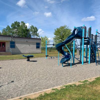 Blue and turquoise playground with spinner