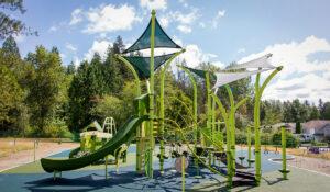 green playground on rubber surfacing