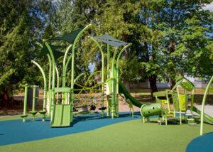 green playground on rubber surfacing