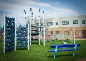 blue and silver playground on turf