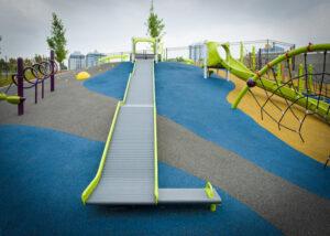 hillside playground with long slides