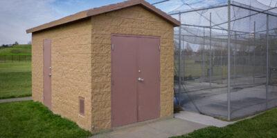 utility building with Split face block walls with cedar shake roof