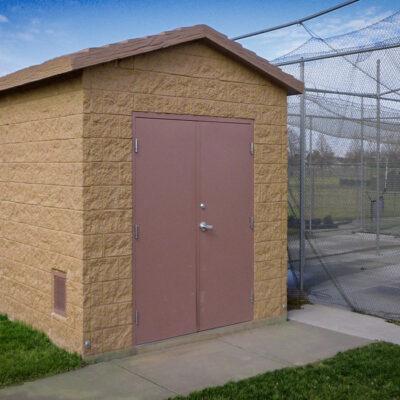 utility building with Split face block walls with cedar shake roof