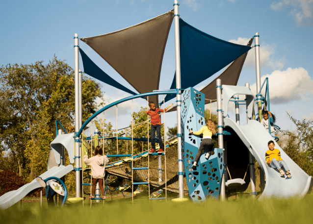 Smart Play Volo - a playground thats blue and silver with slides, nets and pods for jumping