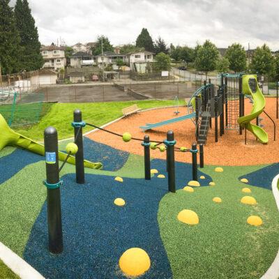 green, blue and brown play structures on EWF