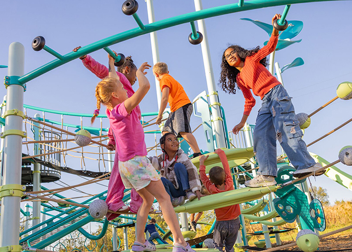 Colourful outdoor playground with whimsical climbers