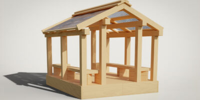 a yellow cedar longhouse with benches and roof