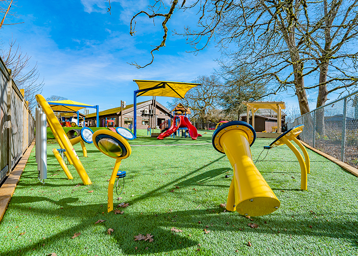 primary coloured playground on grass