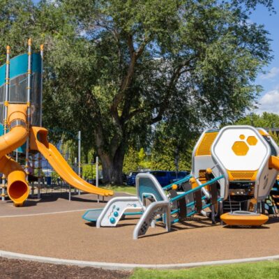 bright playground with tall tower and big slides