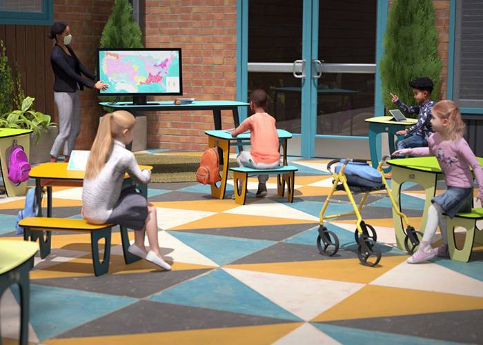 children sitting in outdoor desks