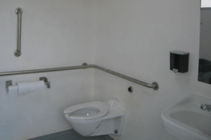 washroom building with Barnwood walls with cedar shake roof